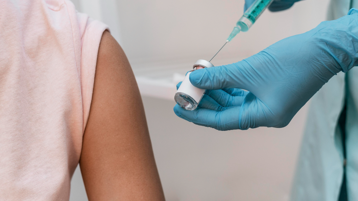doctor preparing vaccine for female patient myths about immunization arnot health
